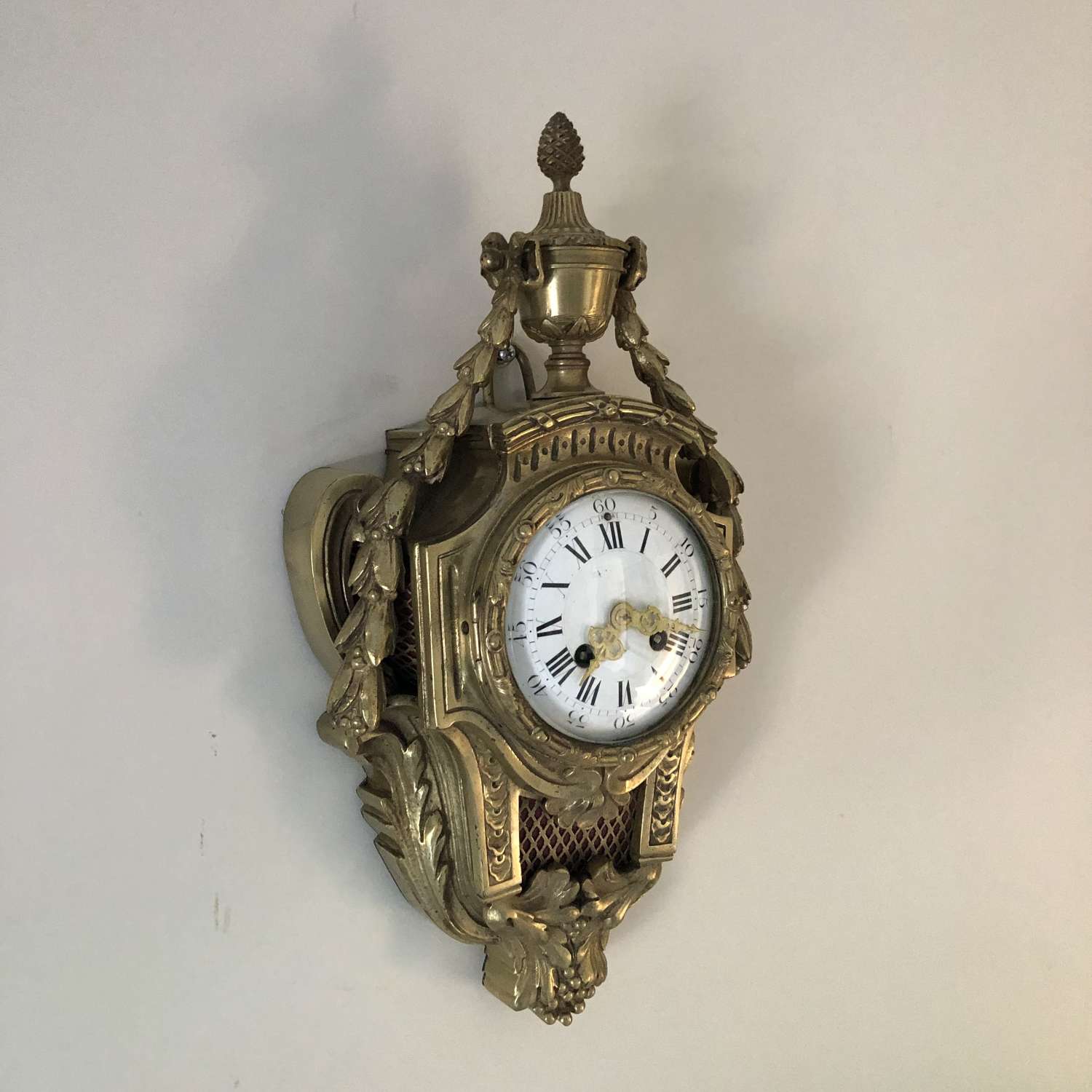 A Gilt Bronze Cartel Clock