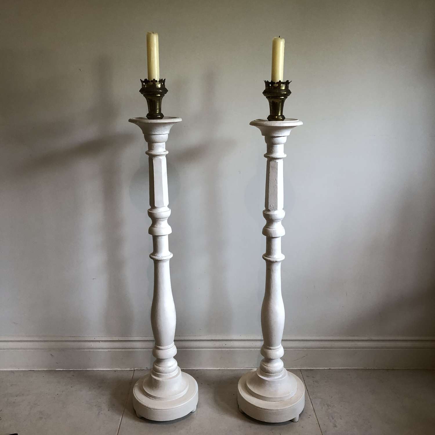 A pair of large candle sticks