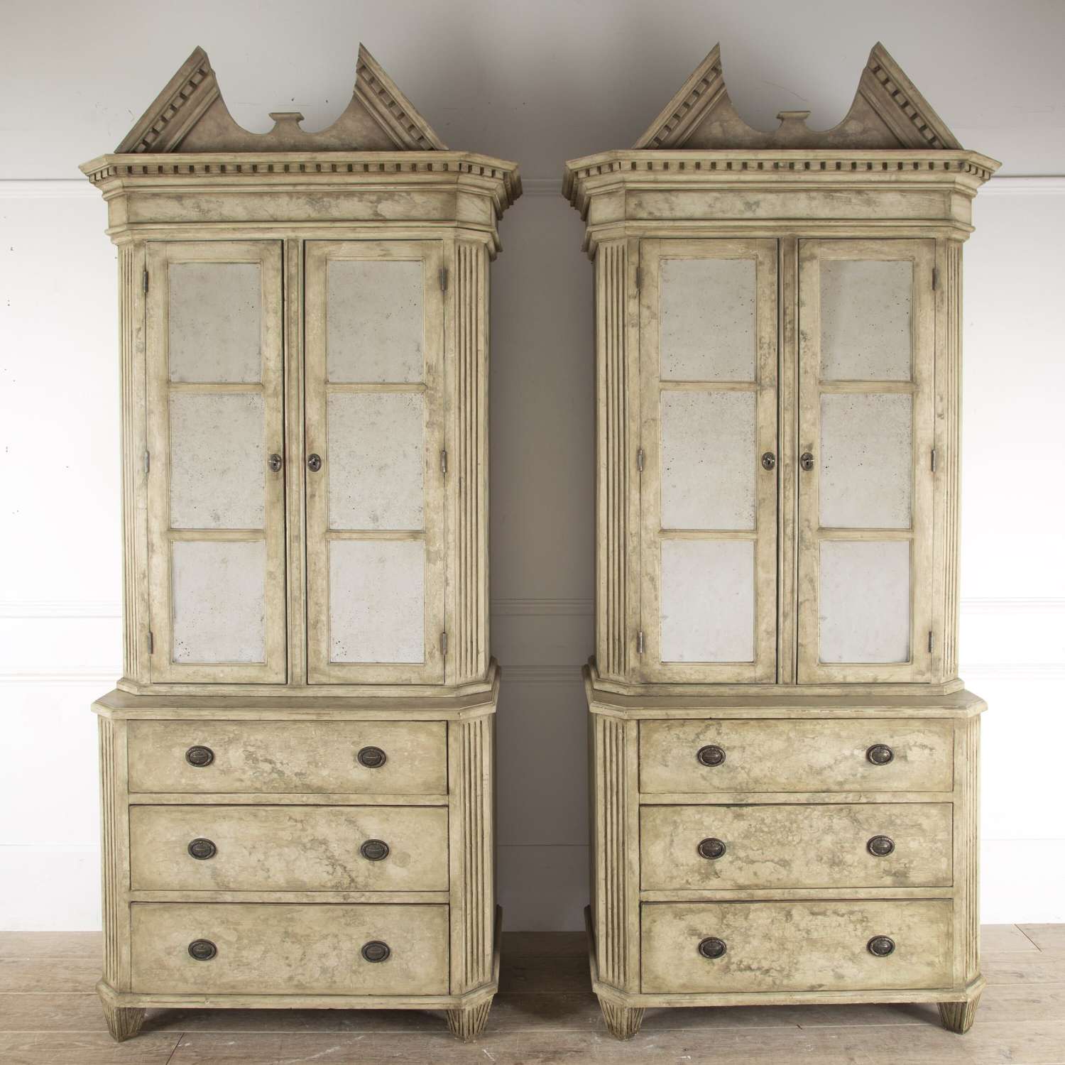 A Pair of Swedish painted library cabinets