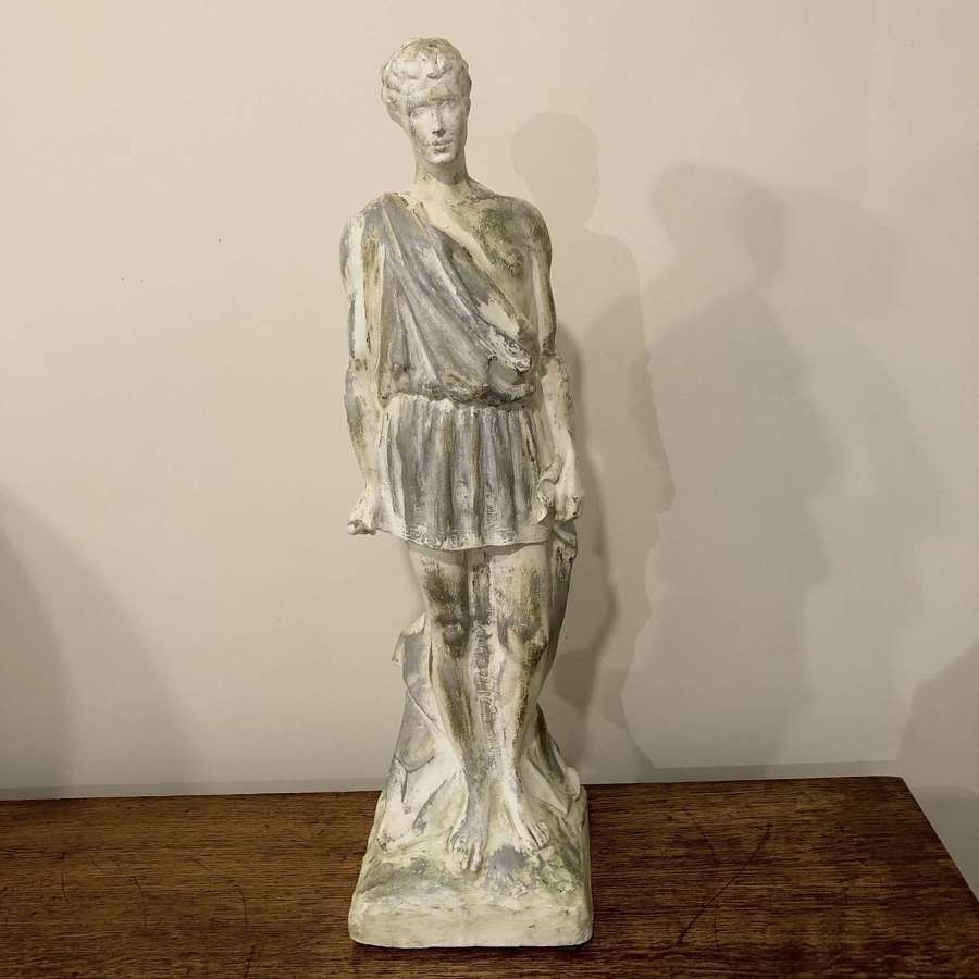 A plaster Greco Roman statuette