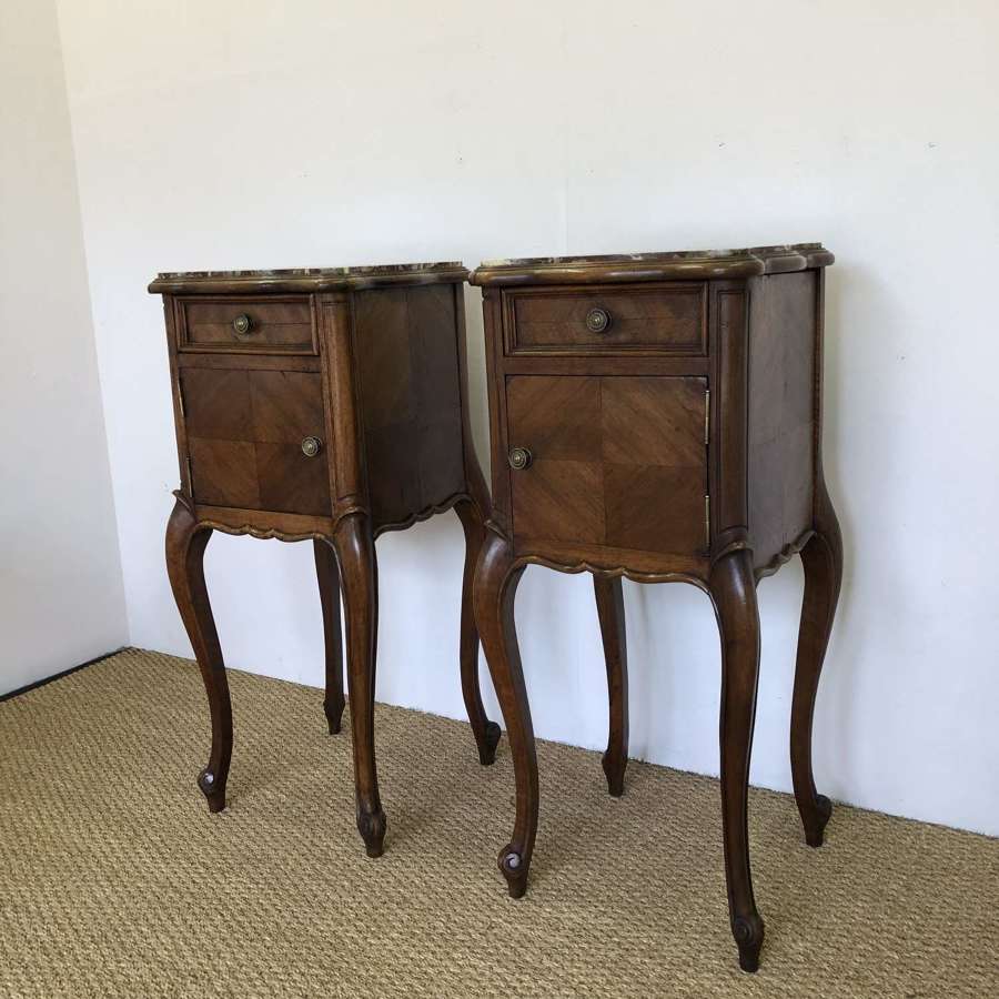 A Pair of Walnut and marble  Bedside tables