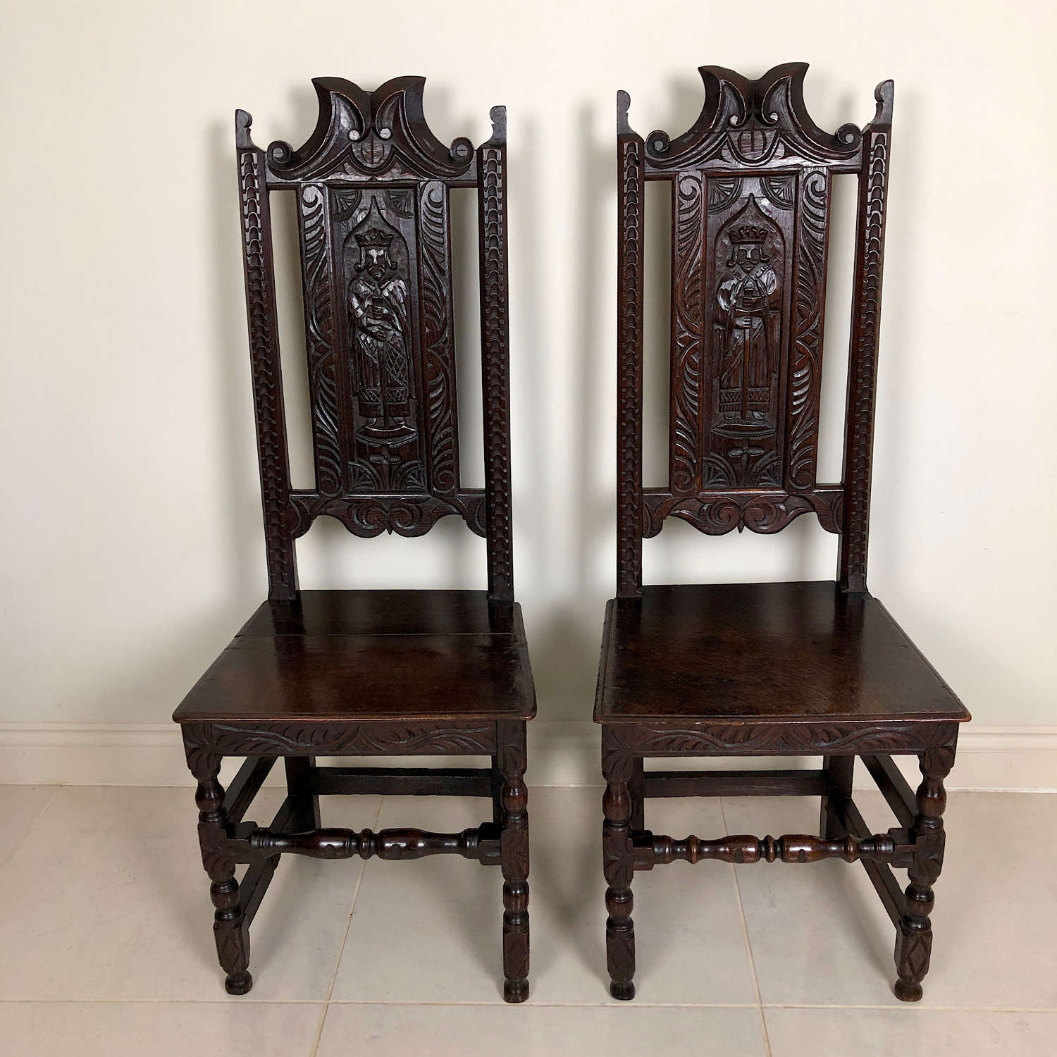 A Pair of Enigmatic Oak Hall / Side Chairs