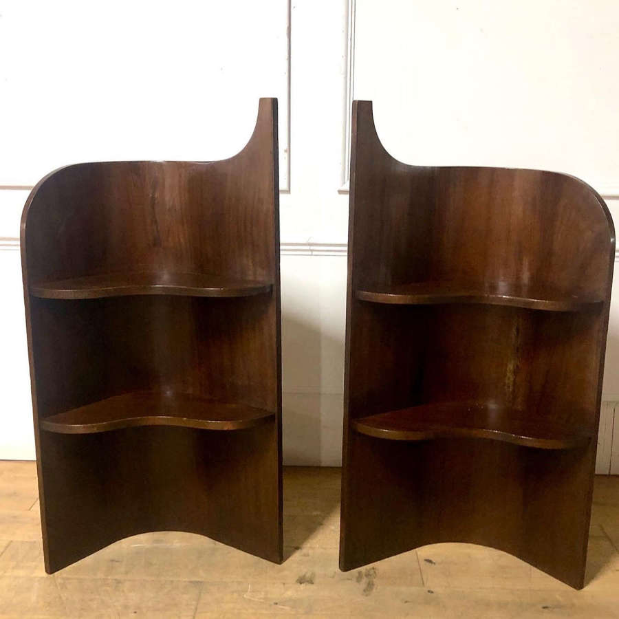 A pair of Curved Open Book Shelves