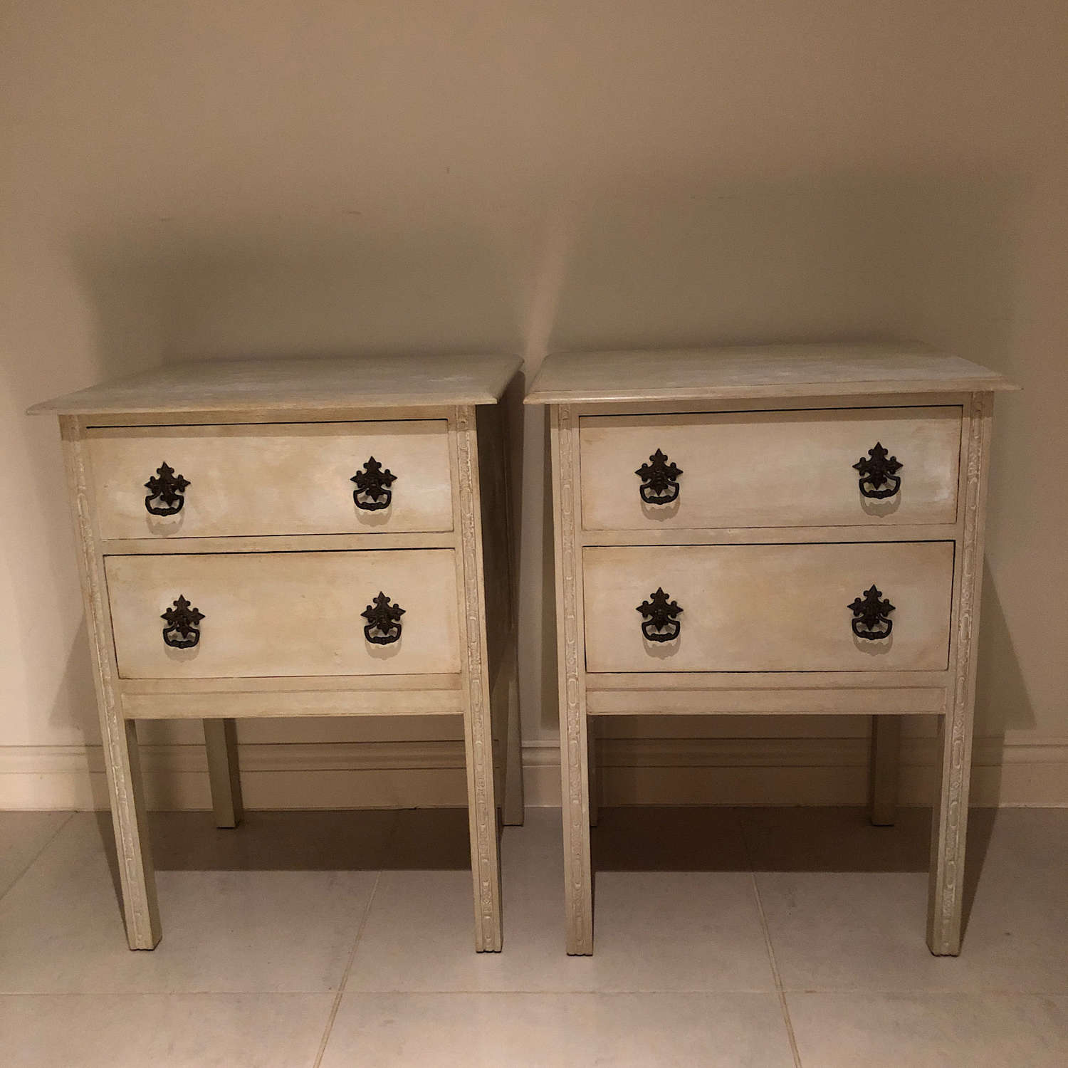 A pair of painted commodes