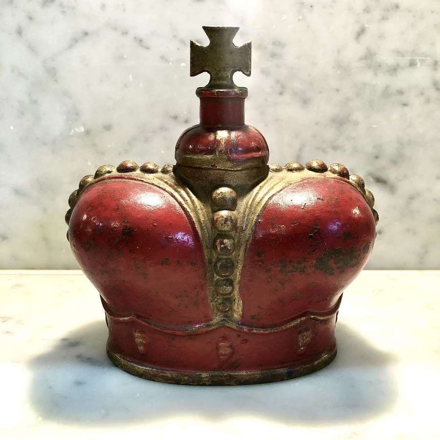 A cast iron crown finial