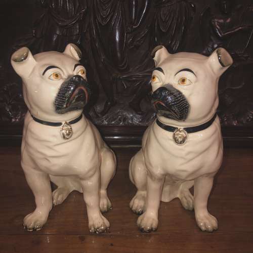 A pair of Ceramic Pottery Pugs