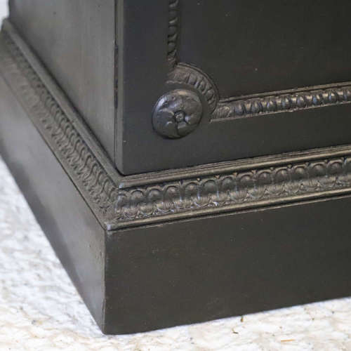 An ebonised Glazed bookcase