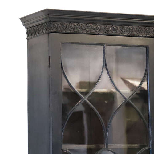 An ebonised Glazed bookcase