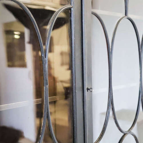 An ebonised Glazed bookcase