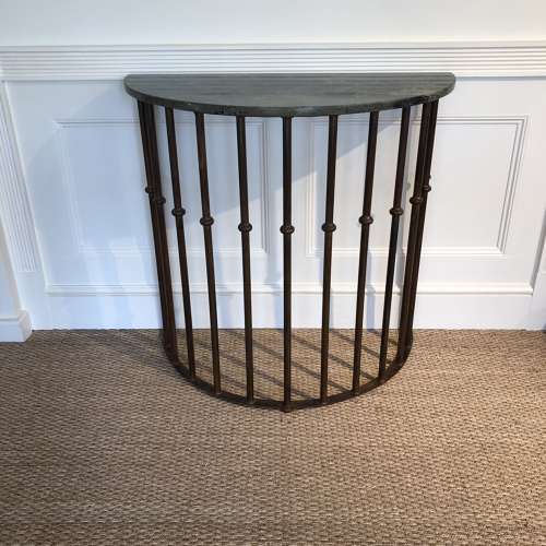 A wrought iron Demi Lune Console table
