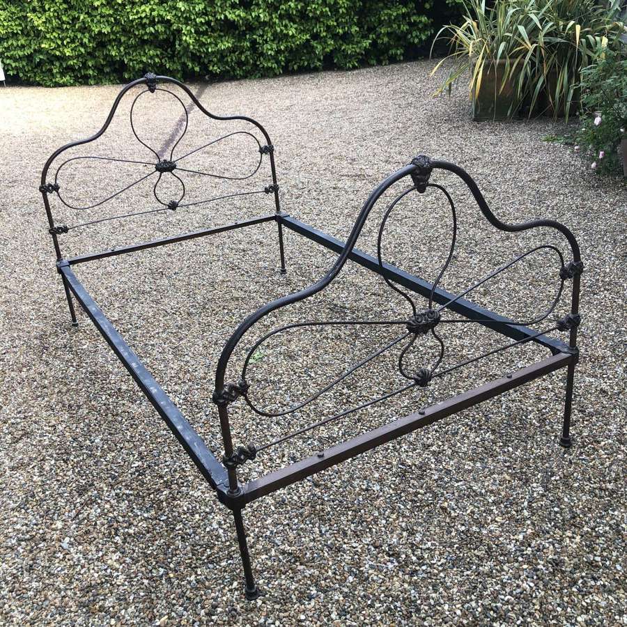 A regency iron bedframe
