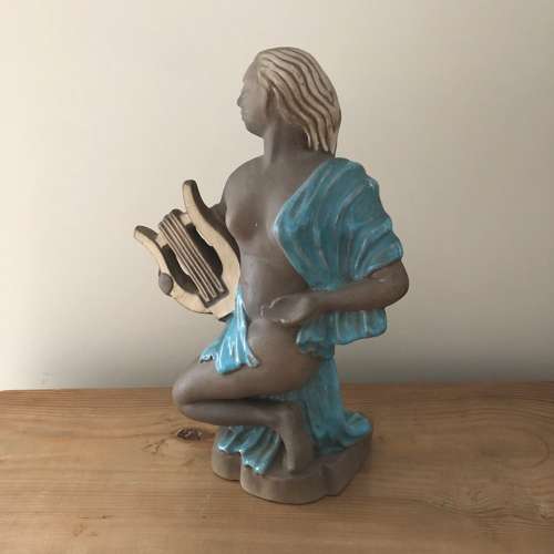 A Charles Murphy pottery figure