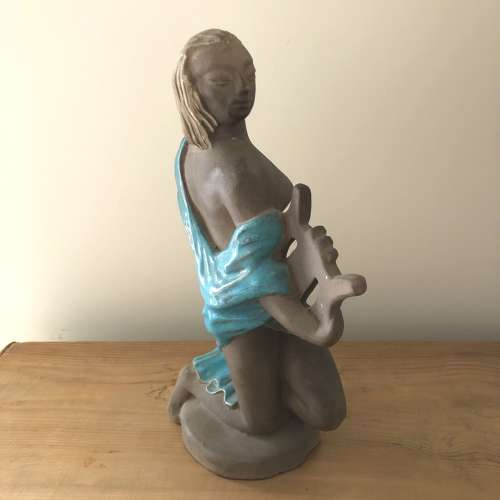 A Charles Murphy pottery figure