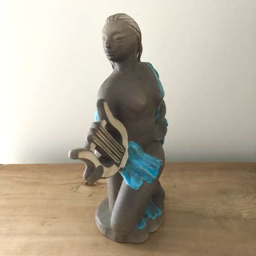 A Charles Murphy pottery figure