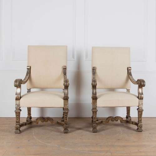 A large pair of throne chairs