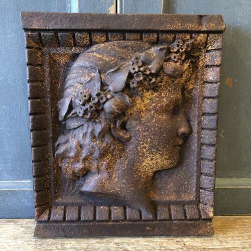 A pair of iron plaques