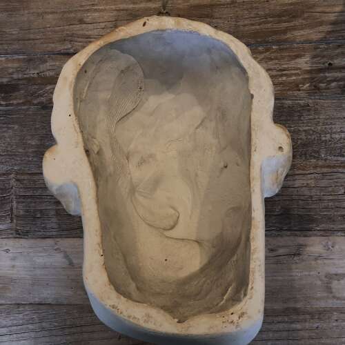 A Classical plaster wall mask
